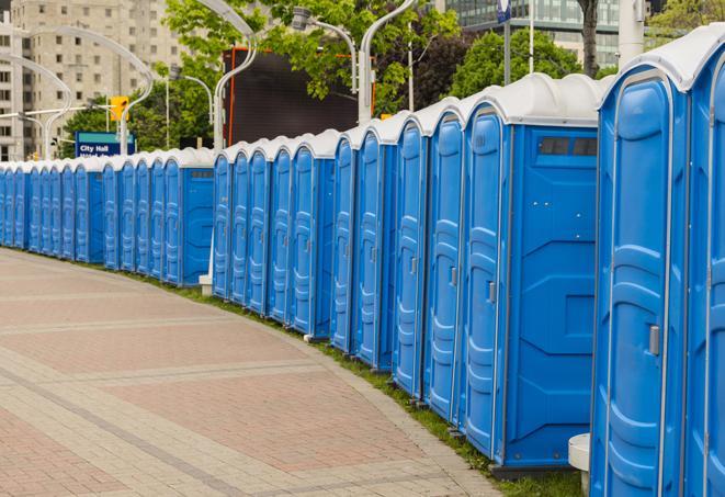 colorful portable restrooms available for rent at a local fair or carnival in Brea